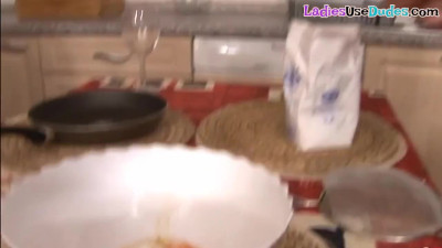 Strapon wielding dominas peg in kinky kitchen threesome