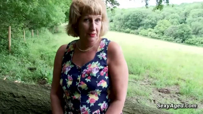British blonde granny Rosemary plays with her pussy outdoor