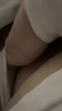 Kimchele with her hand down her pants