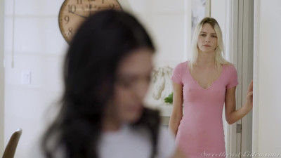Kenna James and Megan Mistakes on a white bed in lesbian and Strap-on dildo scenes