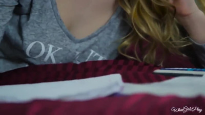 Lyra Law and Kenna James on a red coloured bed in lesbian and lesbian dildo scenes