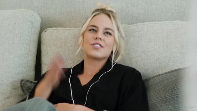 Little Puck and Kelsey Kane on a grey and white bed in several lesbian scenes
