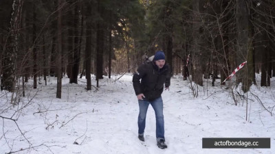 Barefoot Claudia is captured in the cold winter forest