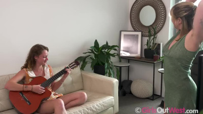 Juliette and Taylah Rose  on a sofa and on floor in GirlsOutWest lesbian scenes