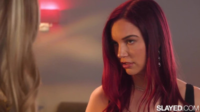 Jayden Cole and Haley Reed on a red coloured pool table in a lesbian scene together